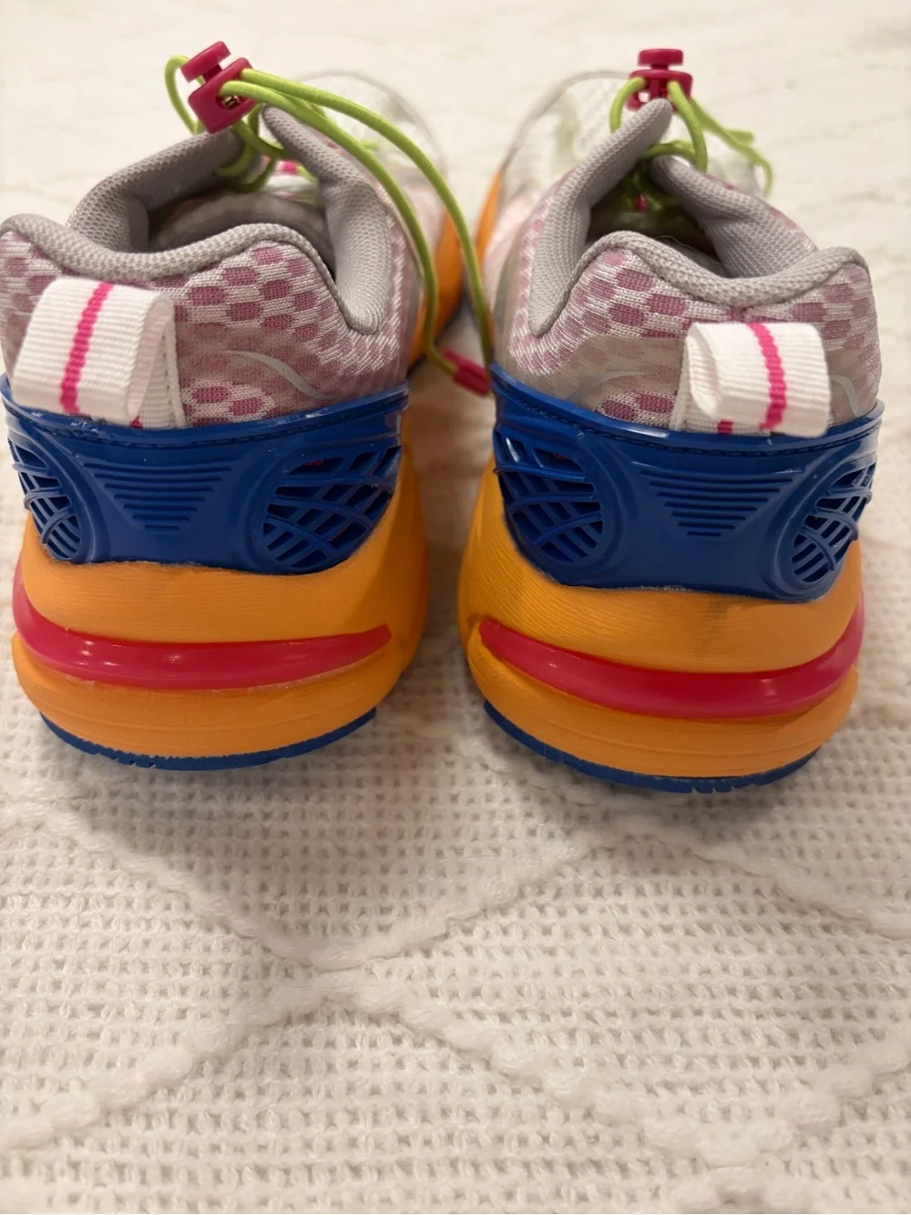 Avia Women's White Athletic Running Shoes with Blue, Pink and Yellow Accents